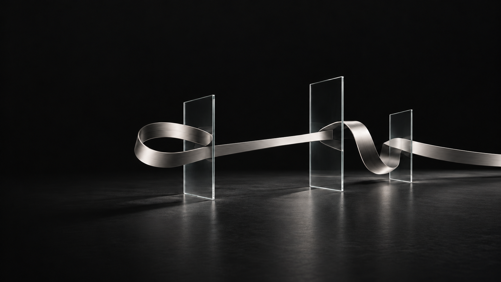 Abstract silver ribbon passing through glass portals against a near-black background.